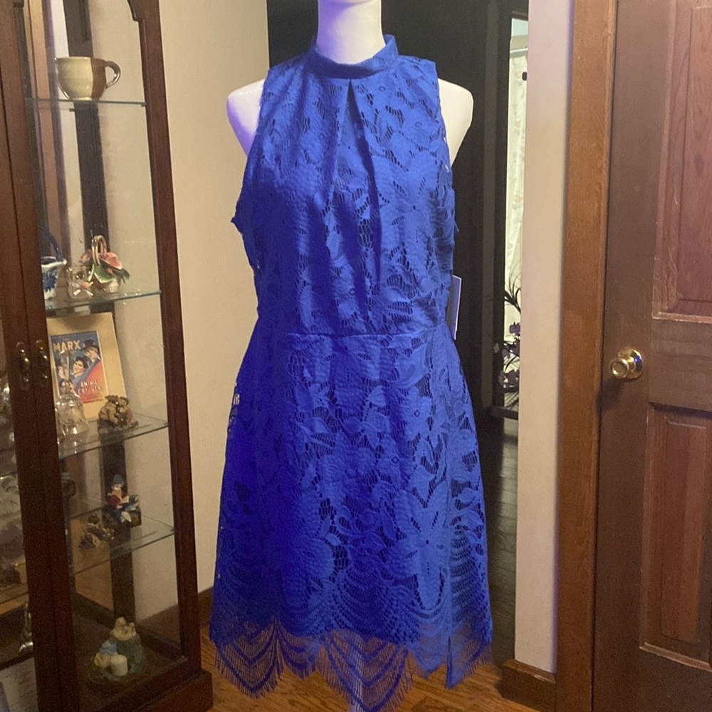 NWT size large Love Fire blue dress perfect condition. Beautiful!